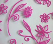Cerise flock iron-on flower on black net