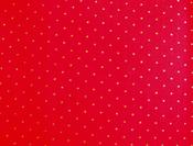 Gold dot on red cotton image