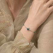 Newgrange Living Silver Claddagh Bracelet with Green Stone image