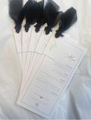 Individually Named Wedding Menus with gold eyelet and ribbon