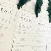 Boheme Individually Named Wedding Menus with gold eyelet and ribbon