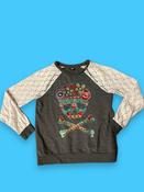 Rubynee Vintage y2k top in grey and white with skull symbol image