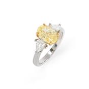 Platinum and Natural Fancy Light Yellow Diamond Three Stone Ring image