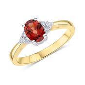 9k Oval Cut Garnet and Diamond Ring