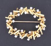 Modernist Diamond and Gold Brooch - Weldons Jewellers image