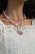 Pearl and clam shell necklace image