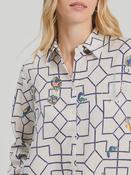 White shirt with geometric print in navy and fun motif all over. image