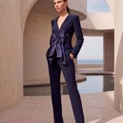 Navy 2 piece trouser suit with v neckline and large taffeta bow on the waist image