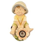 Boy sits with Solar Flower image