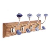 Blue and White Hooks On Wooden Base image