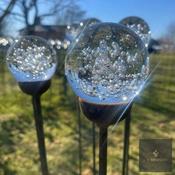 Bubble filled glass ball stake.