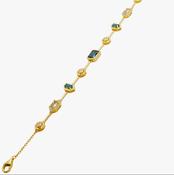 Thin gold toned bracelet with blue stones 38806 image