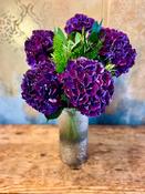 Purple Hydrangea Blooms in Vase - De Luxe image