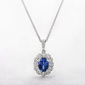 1.02ct Oval Cut Sapphire and 0.40ct Diamond Pendant in 18ct White Gold