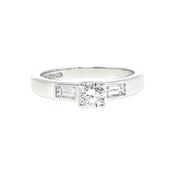 0.59ct Round Cut Natural Diamond Solitaire With Baguette Side Diamonds Set In 18ct White Gold image
