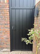 Box section steel gate composite infill coded lock.