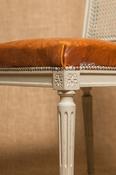 A Pair of French Neoclassical Painted Leather Chair with Rattan back