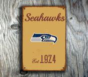 Seattle Seahawks Sign - Pacific Northwest 12th Man Plaque, Emerald City Styling, Weatherproof Construction, Bold Navy &amp; Action Green Colors - 14-x-10