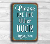 Use The OTHER DOOR Sign – Retro Business Wall Sign, Full Color UV Print, Aluminum Composite, Pre-Punched Holes for Mounting - 14-x-10