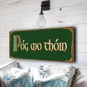 Póg mo thóin Irish Sign – Handmade in Ireland, Celtic Lettering, Authentic Irish Gifts, Durable UV Protected Signs - 12-x-4-inches