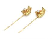 Matching pair of diamond set wolf stick pins in yellow gold image