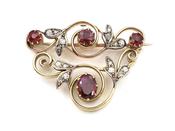 Garland style ruby and diamond brooch in yellow gold image