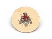 1906 fly disk brooch in 18kt yellow gold image