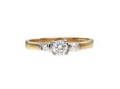 Flanked diamond solitaire engagement ring in 18kt yellow gold image