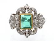 Art Deco emerald and diamond cluster ring in gold and platinum image
