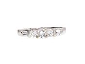 Diamond flanked solitaire engagement ring in 18kt white gold image
