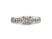 Rectangular diamond flanked solitaire engagement ring in platinum image