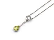 Contemporary diamond and fancy green diamond drop pendant image