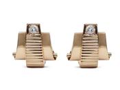 1940s diamond set ribbed and scrolling trapezoid earrings in rose gold image
