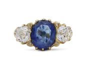 Antique sapphire and diamond graduating three stone engagement ring in gold image