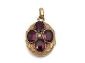 Antique French seed pearl and garnet oval locket in 18kt yellow gold image