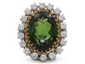 Retro green tourmaline and diamond oval cluster ring in gold and platinum image