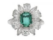 1950s emerald and diamond fancy cluster ring in platinum image