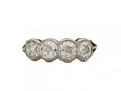 Antique Old Mine cut diamond four stone ring in gold