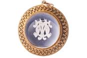 Victorian Essex rock crystal gold pendant enclosing initials T.O.M, circa 1870 image