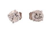 A pair of diamond stud earrings in 18kt white gold