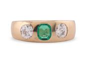 Emerald and diamond three stone ring image