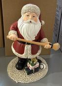 Santa with hurling stick 10x8x15cm image