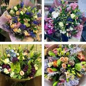 Sympathy hand-tied made with the finest flowers
