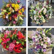 Sympathy hand-tied made with the finest flowers image