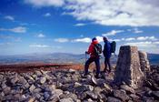 Walkers at the summit of Slieve Gullion, Co Armagh, Northern Ireland.