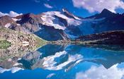 Reflection of the Wilder Freiger, Stubai Hohenweg, Tirol, Austria.