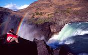 Trekker beside Salto Grande, Torres del Paine National Park, Patagonia, Chile.