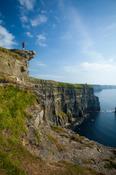 Walker on the Cliffs of Moher Coastal Path, County Clare, Ireland. image