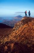 Walkers at the summit of Diamond Hill, Connemara National Park, Co Galway, Ireland.