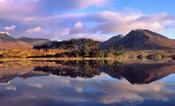Dawn reflections of the Twelve Bens, Derryclare Lough, Connemara, Co Galway, Ireland. image
